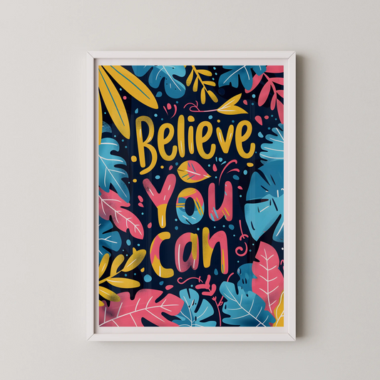 A modern wall art print featuring the bold typography "Believe you can" surrounded by lush tropical leaves in vibrant colors.