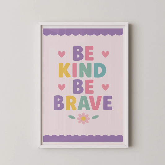 A modern typographic poster with the words "BE KIND BE BRAVE" in pastel rounded letters, adorned with pink hearts and a daisy.