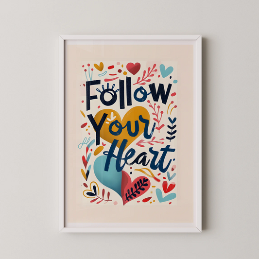 A modern wall art poster with the text "Follow Your Heart" in bold display type, surrounded by decorative elements and hearts, in a pop-folk hand-lettering style.