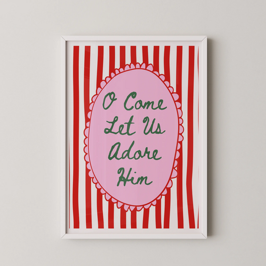 A vintage-style typography poster with the phrase 'O Come Let Us Adore Him' in forest green script on a pink oval plaque against red and white stripes.