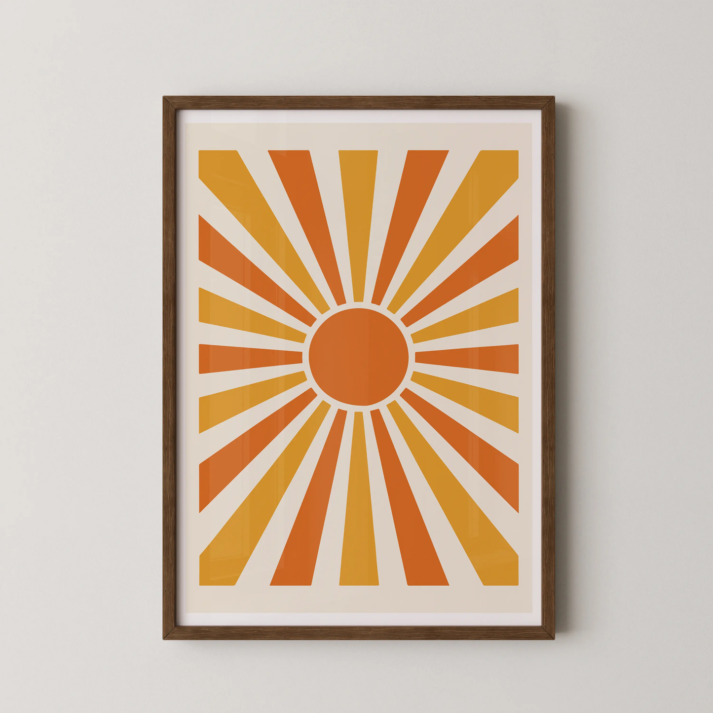 An abstract geometric sunburst artwork in a mid-century modern style, featuring warm tones of orange, yellow, and amber.