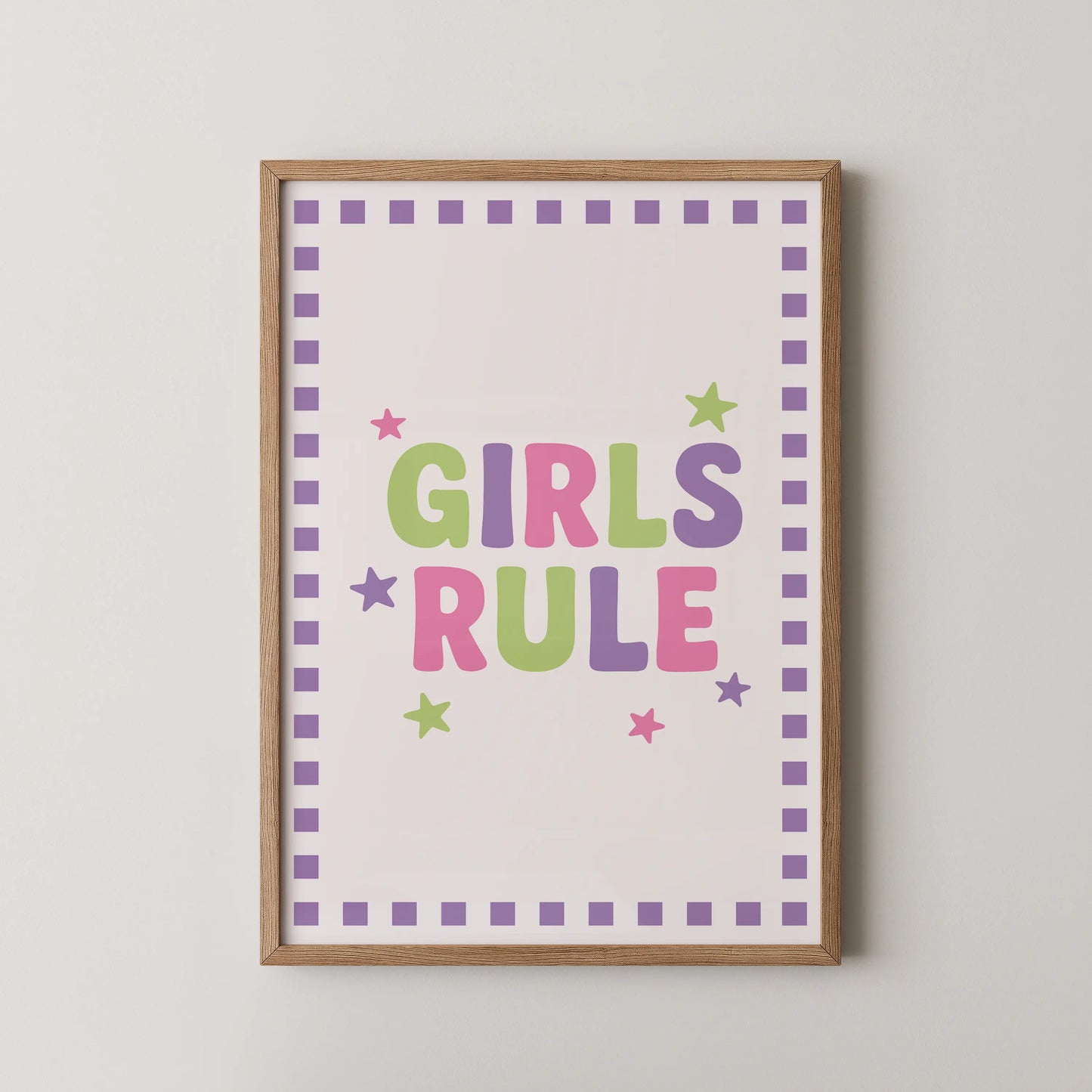 A modern graphic poster with pastel typography featuring the text 'GIRLS RULE'.