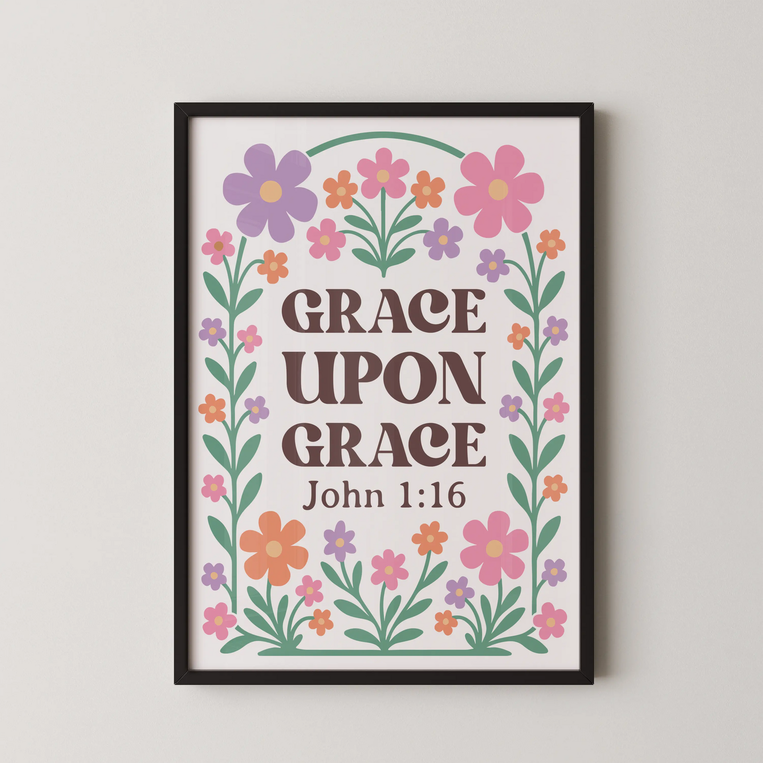 A modern floral quote wall art featuring the words "Grace Upon Grace" surrounded by whimsical flowers in lavender, pink, mint green, and orange.