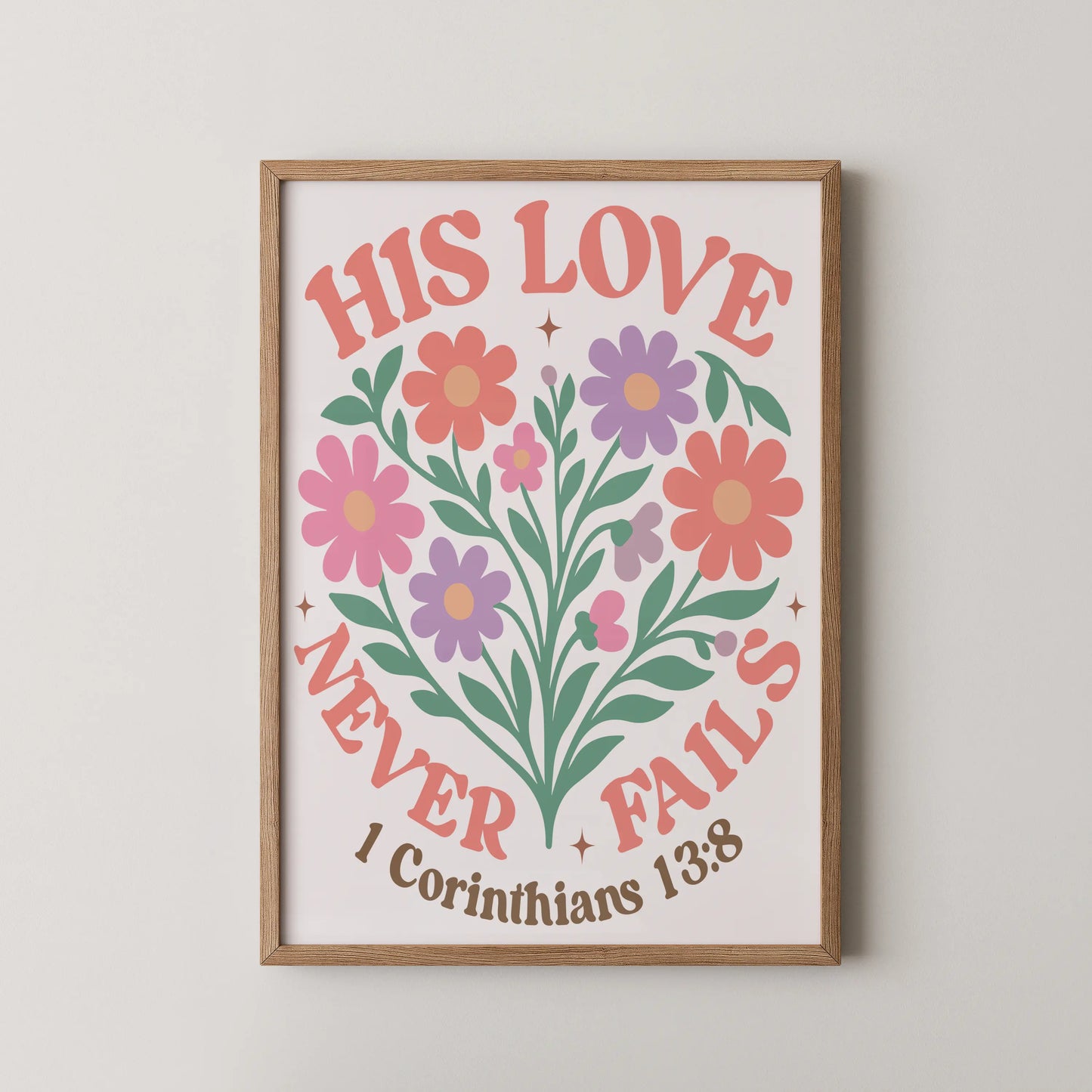 A modern illustrative wall art featuring floral elements with the text "HIS LOVE NEVER FAILS" against a pale background.