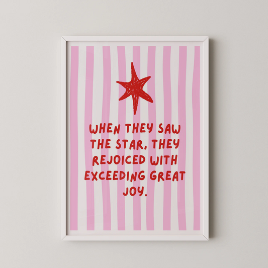 A Pop Art style wall art featuring a red star above pink stripes with text.