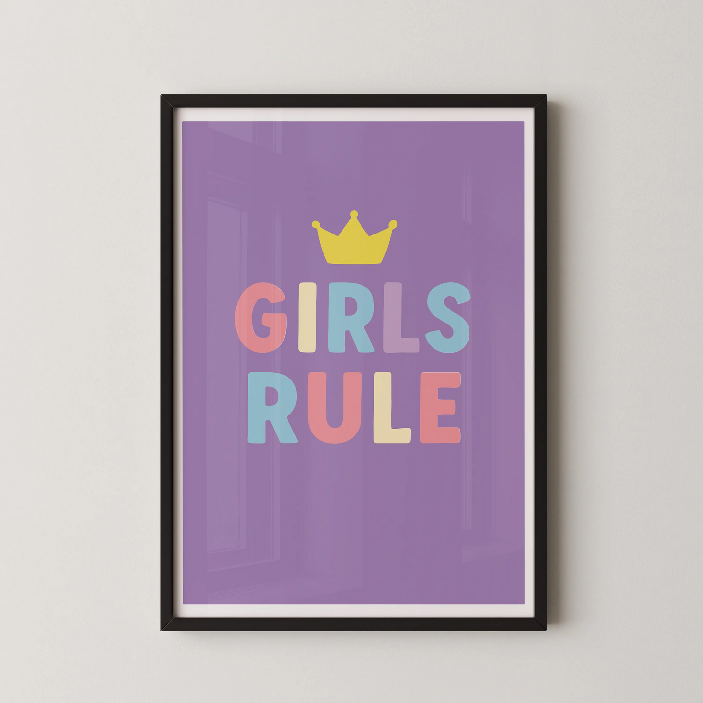 A pop art style graphic design featuring the text "GIRLS RULE" with a crown, in pastel colors.
