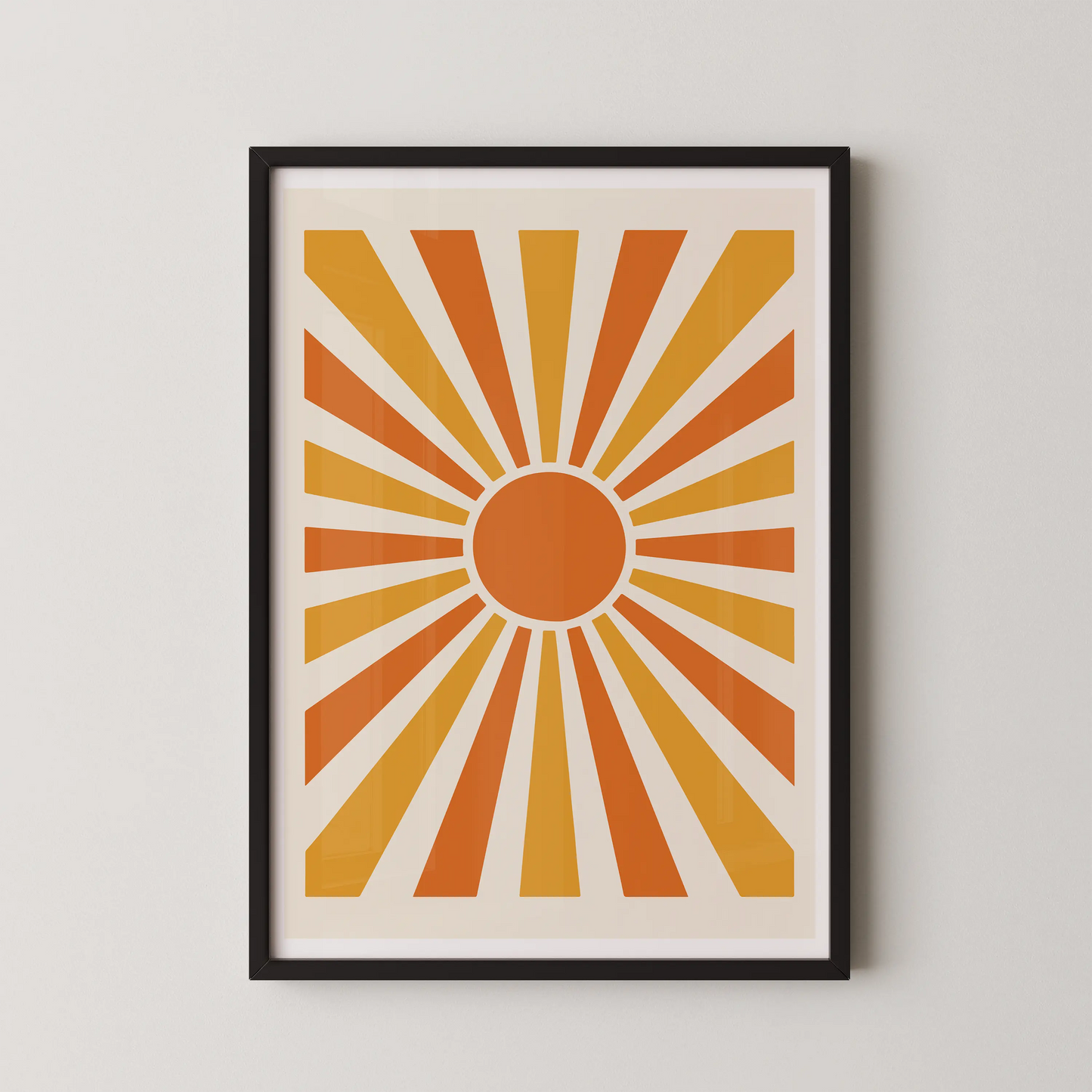 An abstract geometric sunburst artwork in a mid-century modern style, featuring warm tones of orange, yellow, and amber.