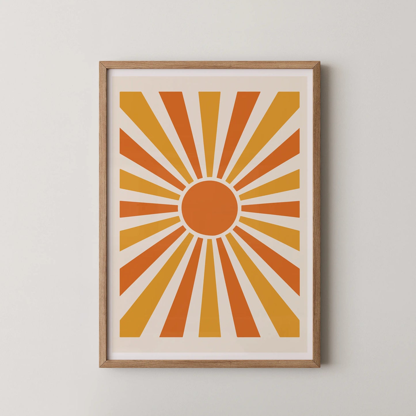 An abstract geometric sunburst artwork in a mid-century modern style, featuring warm tones of orange, yellow, and amber.