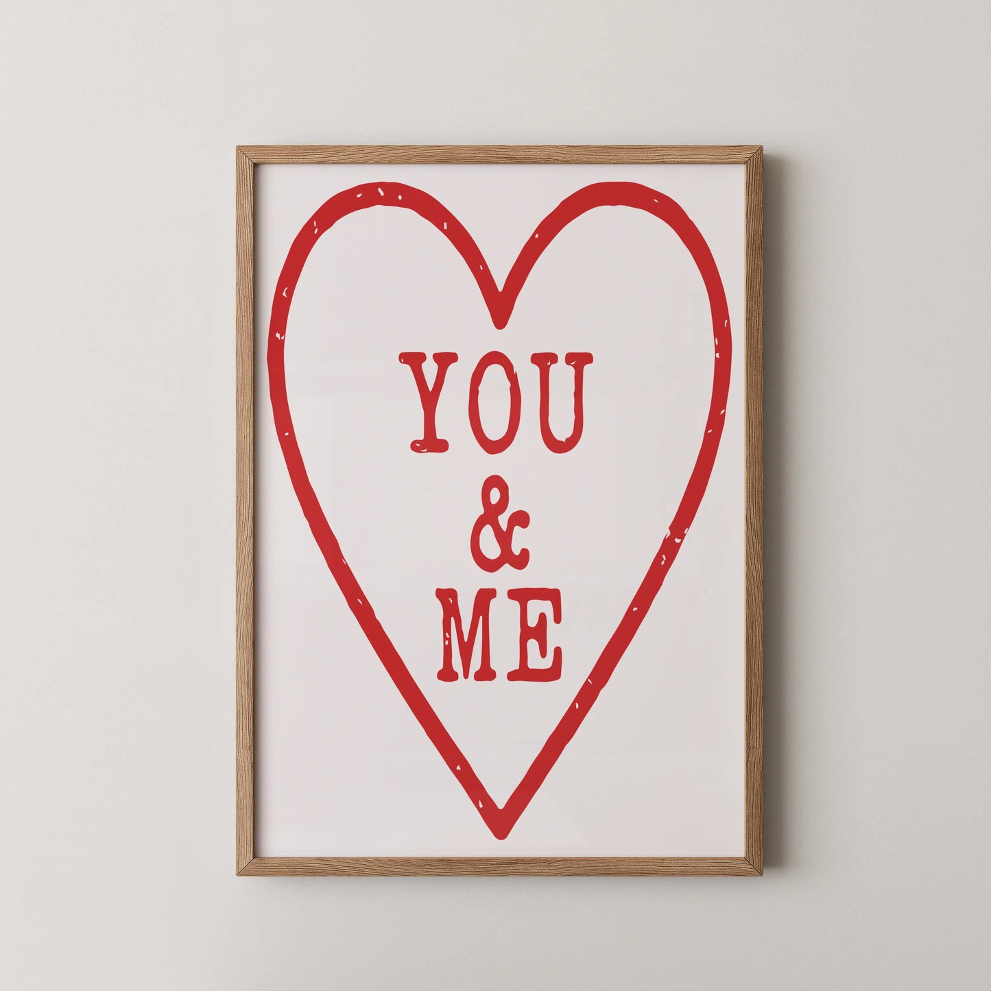 A Pop Art style wall art print featuring a bold red heart outline with typography YOU / & / ME inside on a black background.