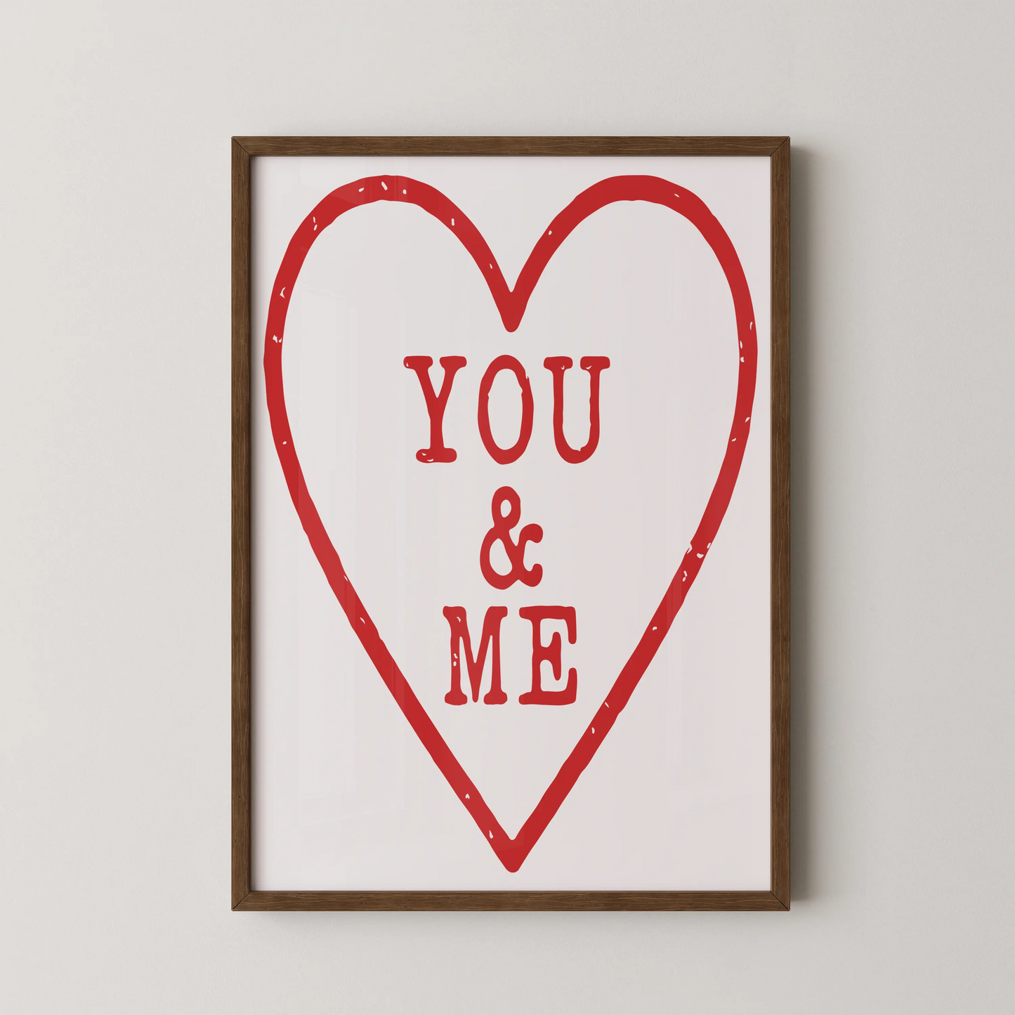 A Pop Art style wall art print featuring a bold red heart outline with typography YOU / & / ME inside on a black background.
